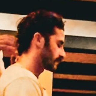 Joel treating Peter's neck and shoulders