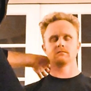 Joel treating Aren's shoulder