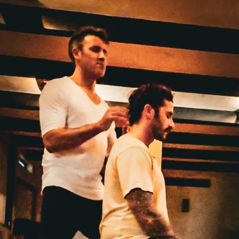 Joel giving Peter a healing